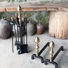 Antique Fire dogs and 4 piece fire set solid brass tops and steel
