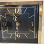 Gold clock with black face Image 3