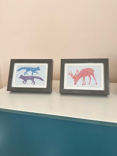 four framed pictures