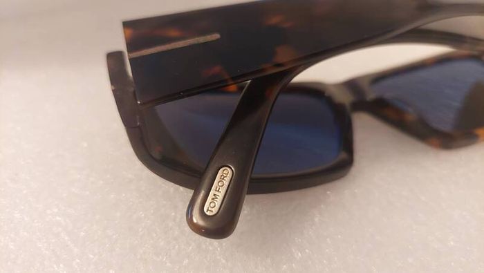 genuine Tom Ford sunglasses , those ultra luxury, head-turning