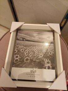 Floating white photo frame