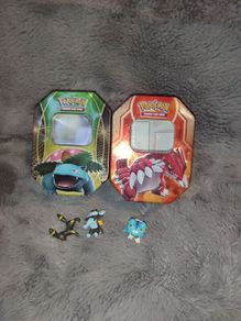 Pokemon card tins and toys