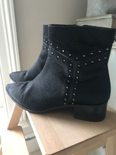 black leather Maruti ankle boots