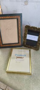 3 itmes-1- brass Picture frame. 13 x 18 cm 12.00 euro. 2-  Ornate, vintage-style gold-tone or brass metal picture frame with an embossed leaf and grape motif, designed to hold a 3.5 x 5 inch photo. 15.00 EURO. 3- 5 x 7 inch picture frame featuring a disti
