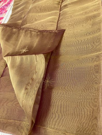 A Pair of Tab Top Voile Curtains. ( Gold) 110 x 230 cm New.