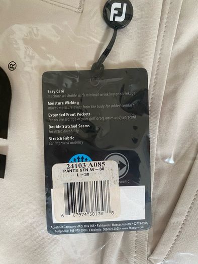 Beige FootJoy golf trousers
