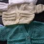 New baby cardigans x6 and 2 hats .Hand knit  .2 blue  1 lemon 2 white 1 green 2 blue hats .Size 0-3 months never worn .25 euro the lot .Collection Dublin 13 Image 2