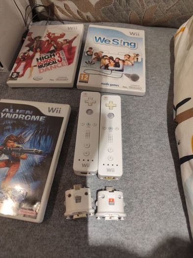 Wii Bundle with Pokemon, Mario Bros, Sports and Sports Resorts
