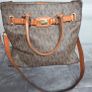 Michael Kors brown signature large handbag with shoulder strap. Spacious interior with multiple pockets. In perfect condition apart from one small tear, as shown in the photo. Image 4