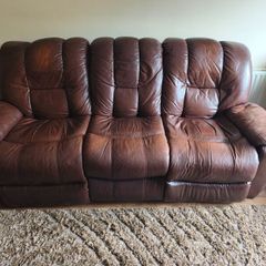Brown leather sofa and Armchair