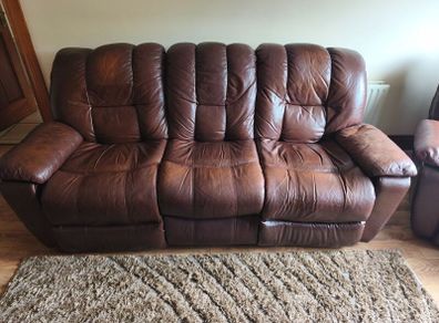 Brown leather sofa and Armchair