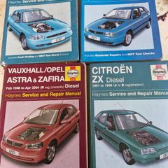 4 Haynes service and repair manuals for various car models.