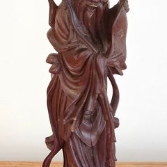 Antique Chinese carved wood sculpture of an immortal wise man inlay