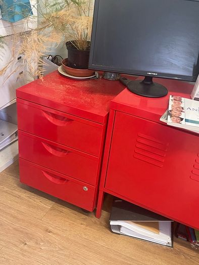Red metal Ikea office cabinets