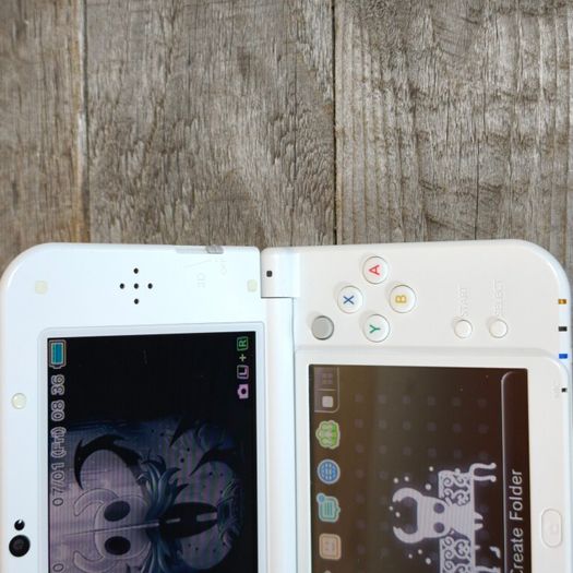New Nintendo 3ds xl pearl white 64gb sd card hshop 1000s free games