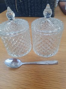 2 decorative storage jars with lids