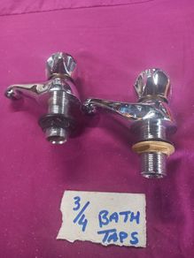 Old Bath taps gold colour