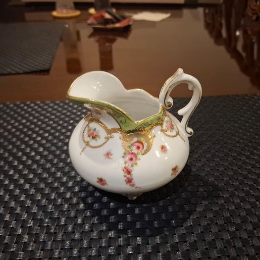 Antique tea pot sugar bowl and milk jug