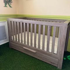 baby crib and baby changing chest of drawers