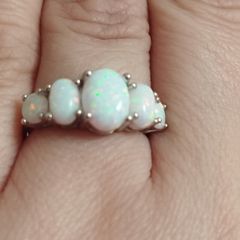 Sterling silver ring with lab opal.