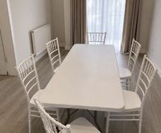 Outdoor table with plastic chairs