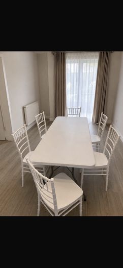 Outdoor table with plastic chairs