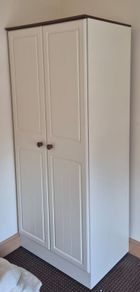 Cream wardrobe and matching headboard