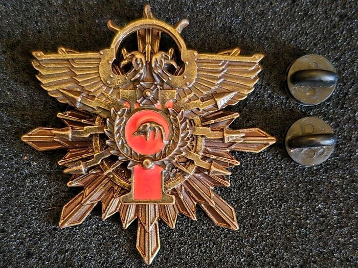 Warhammer,  mark of the ten thousand, Adeptus Custodes emblem.