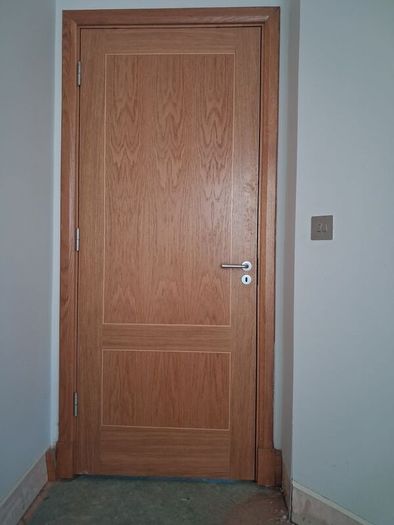 Oak Doors, solid oak frames, architrave and skirting.