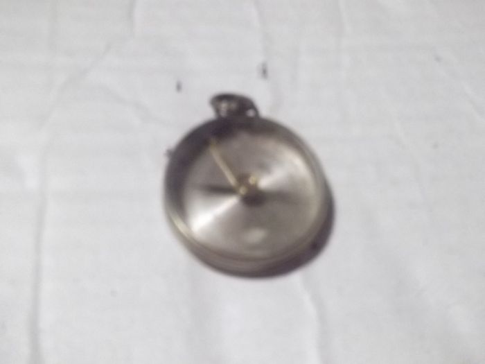 a  antique pocket compass  working