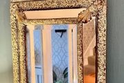 French repousse brass cushion mirror