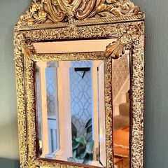 French repousse brass cushion mirror