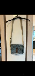 Cath Kidston blue and white polka dot messenger bag