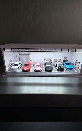 Garage for 1:64 scale toy cars, for Hot Wheels and similar models, with lights.