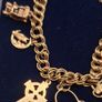 Vintage 9ct yellow gold charm bracelet Image 10