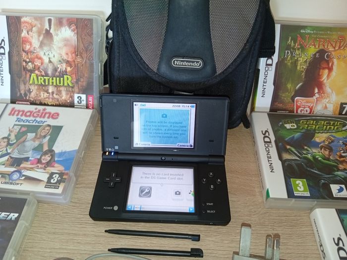 Nintendo Dsi In Black With Official Case And Ten Games Excellent Condition