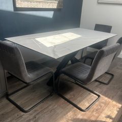 Dining table and four chairs