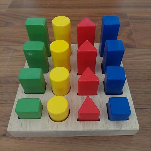 Wooden shape sorting and stacking board