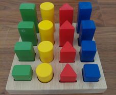 Wooden shape sorting and stacking board