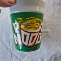 A ceramic novelty Pot Noodle container.
