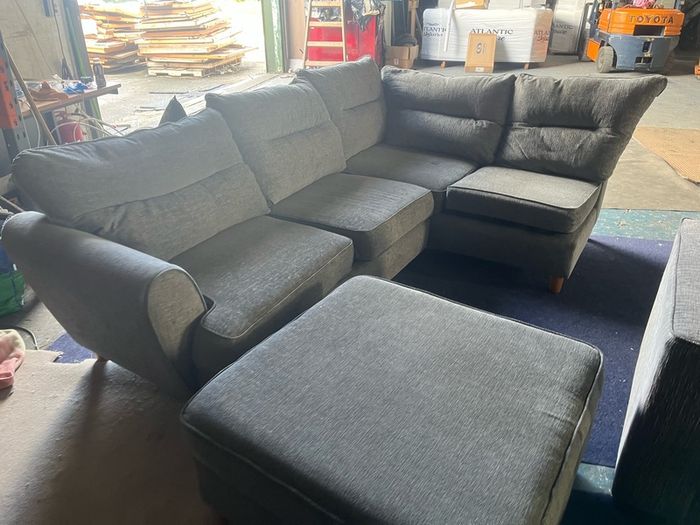 grey corner sofa with matching footstool