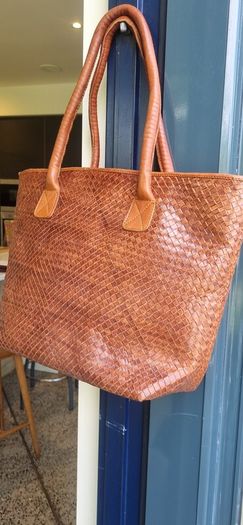 brown leather woven shoulder bag