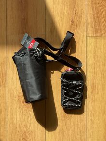 Bottle bag with phone pouch Brand New with tags
