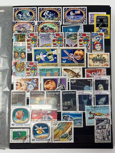 Ace Black 32 page/ 16 leaf Stamp Album with over 900 stamps. Thematic of Animals, Plants, Classic Cars, Space, Trains, Sport & Disney noted.