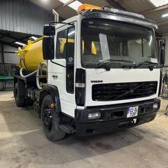 Volvo truck with whale vacuum tanker jetter