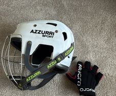 Azzurri sports hurling helmet and right hand glove