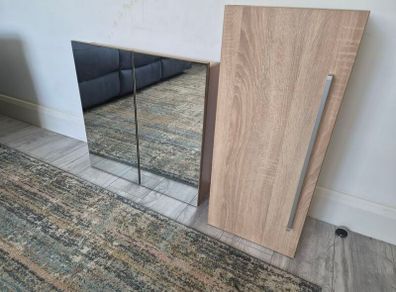 new bathroom cupboard and mirrored cupboard