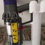 Dyson V10 and Docking station. Image 2