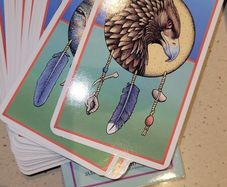 2 Tarot decks; 1 Medicine, 1healing and 1 Angel cards, one with a books and some with mini guides.