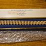 Rare Find. 1960s Avon Starflower gold plated bracelet in original box. Image 2